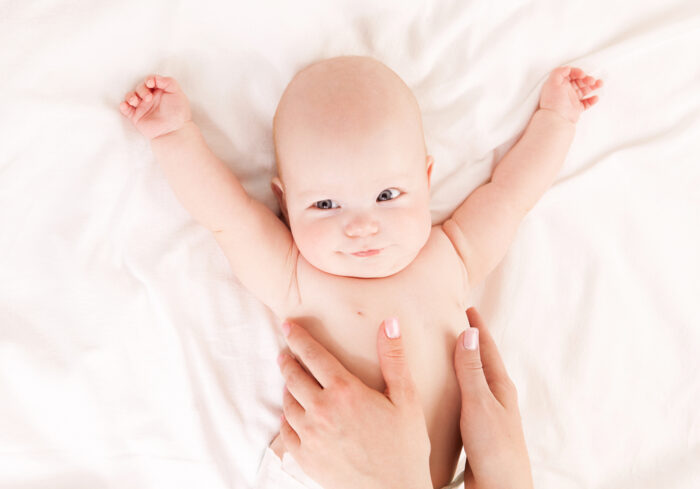 Baby Enjoying a Baby Massage from Mommy