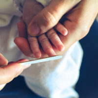 filing baby nails with baby file