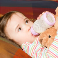 baby drinking from bottle