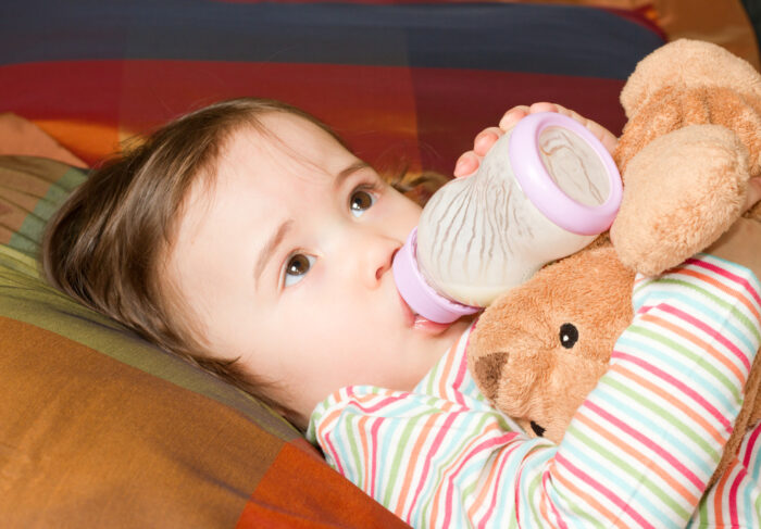 baby drinking from bottle