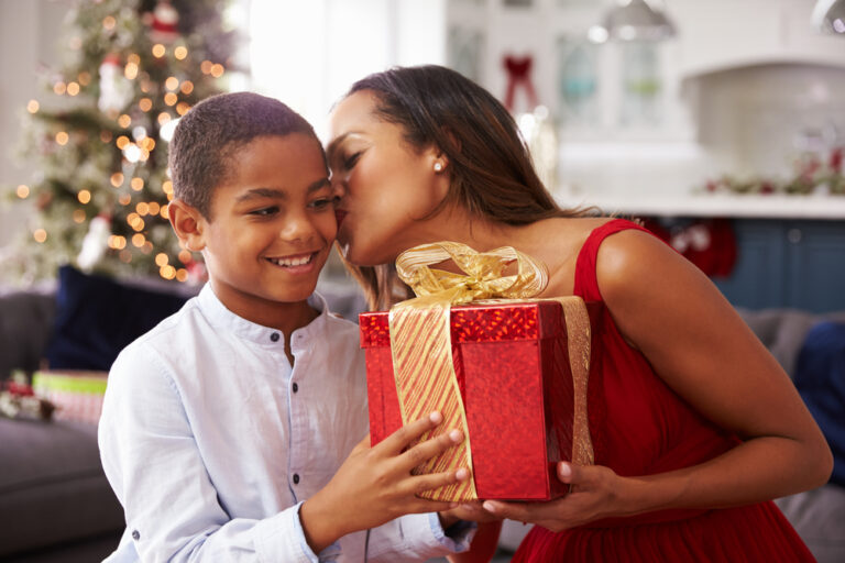 mom giving gift to her 10 year old son