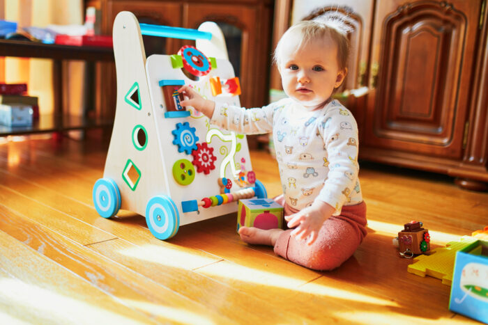 baby playing with walking toy