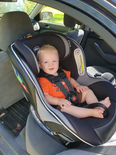 Grandbaby in NextFit Zip Max Extended-Use Convertible Car Seat - Rear-Facing mode