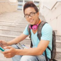 15 year old boy with tablet