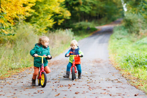 toddlers riding bicycles