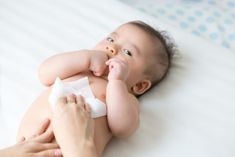 Newborn Baby Getting Washed with Baby WIpes for Sensitive Skin