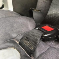 gap where seat belt harness gathers crumbs