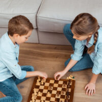 kids playing checkers together