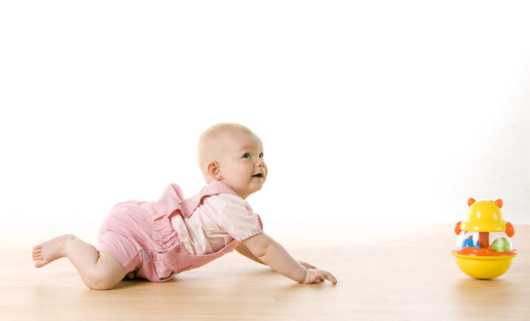 how to help baby crawl