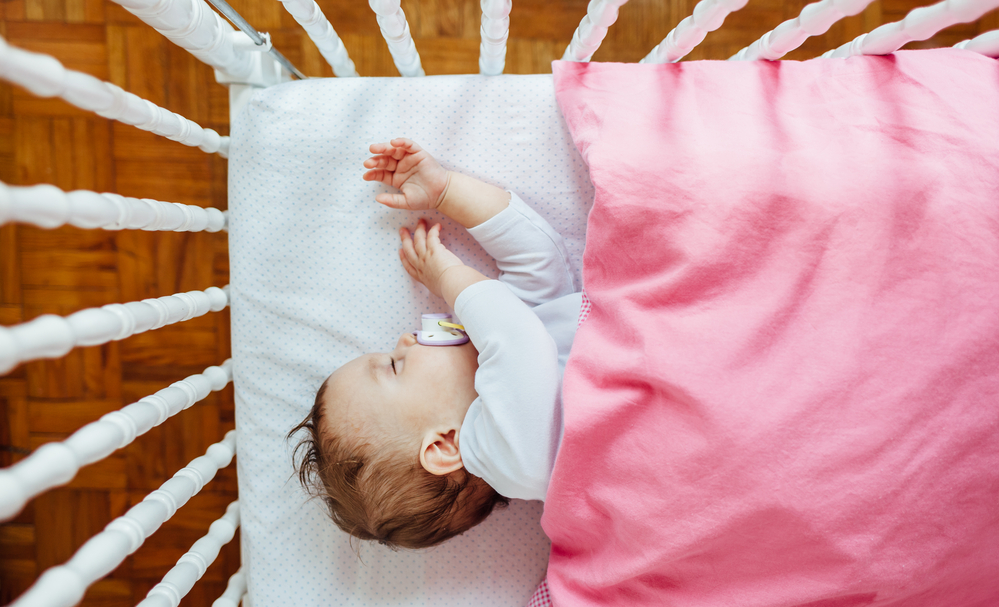 transitioning baby from swing to crib