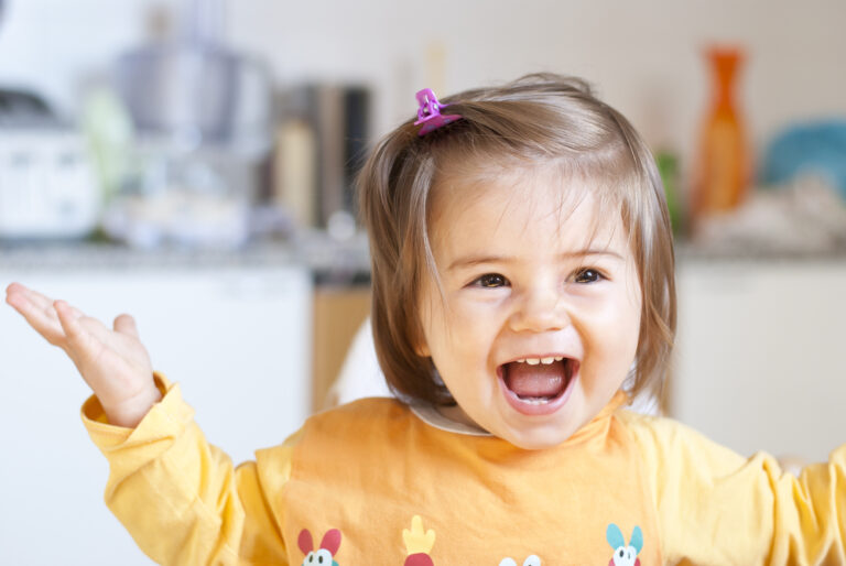 Baby Girl with Hair Pulled Back with Barrette