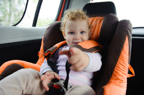 tall baby in a car seat