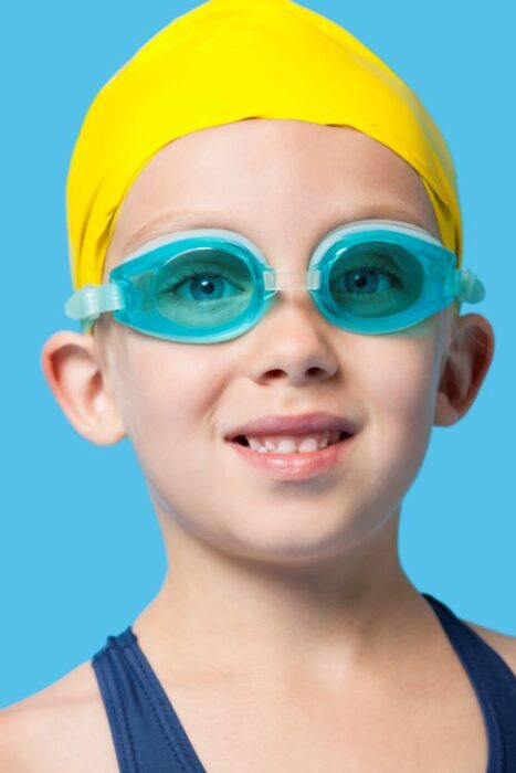 girl in yellow swim cap