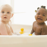 Two Babies Getting a Bubble Bath Together