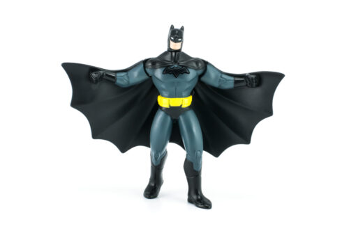 batman action figure toy on white background
