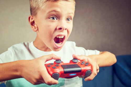 young boy playing video games
