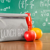 Lunch Bag on Desk in Classroom