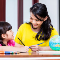 mother and daughter homeschool together