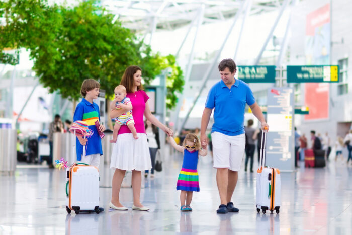 Family with children at airport