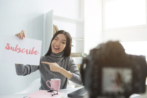 woman recording video for youtube channel