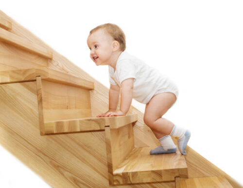 toddler crawling up stairs