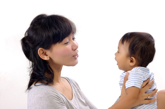 mother talking to her baby