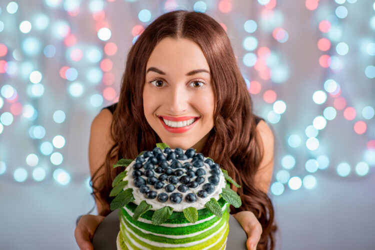 Girl with happy birthday cake