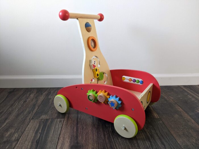 A side-view of the Hape Wonder Walker sitting on the floor.