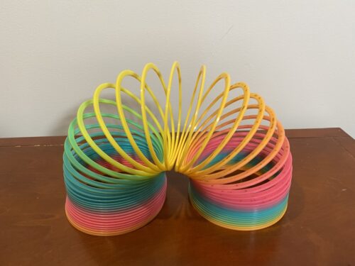 large plastic rainbow slinky