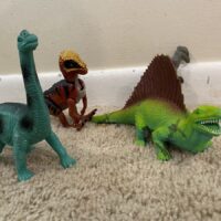 group of plastic dinosaurs