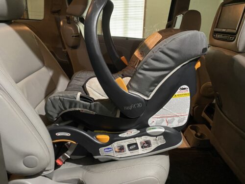 chicco keyfit 30 base latch attached to vehicle seat